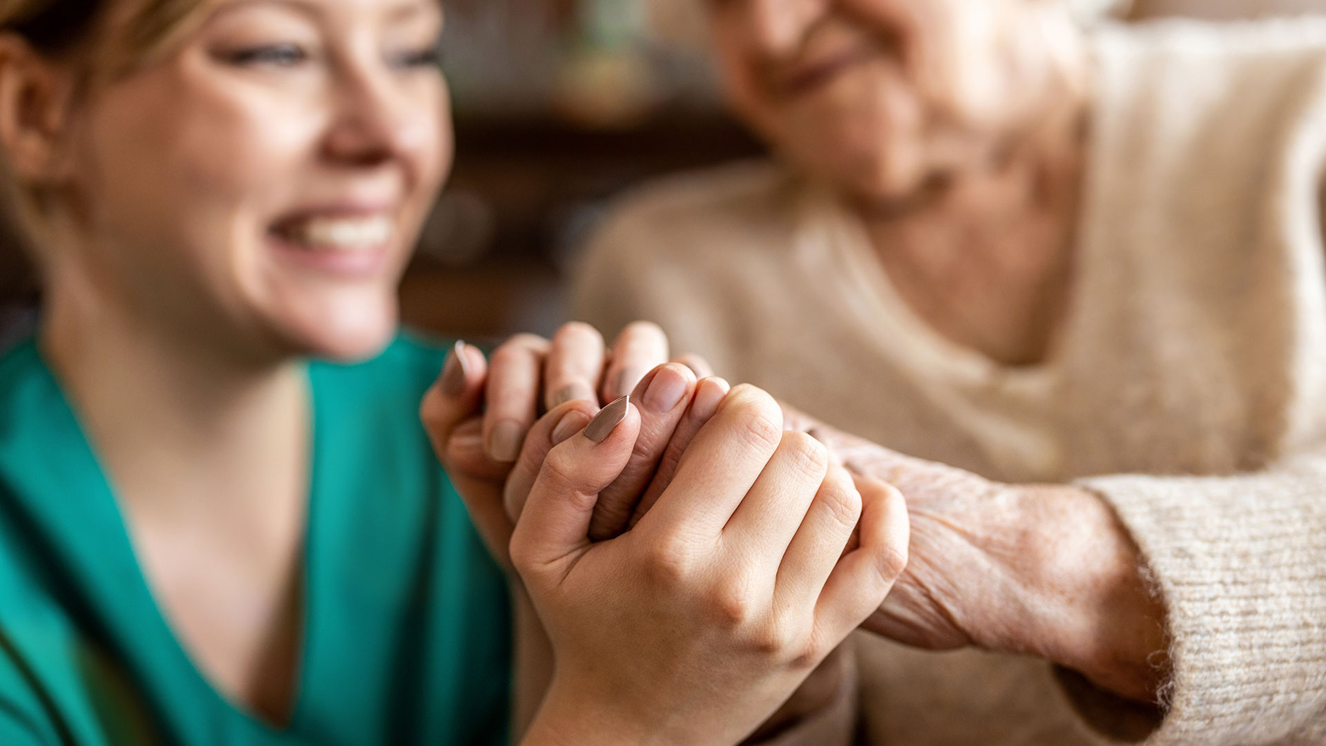 Happy-Valley-Clinic-holding-hands-elderly